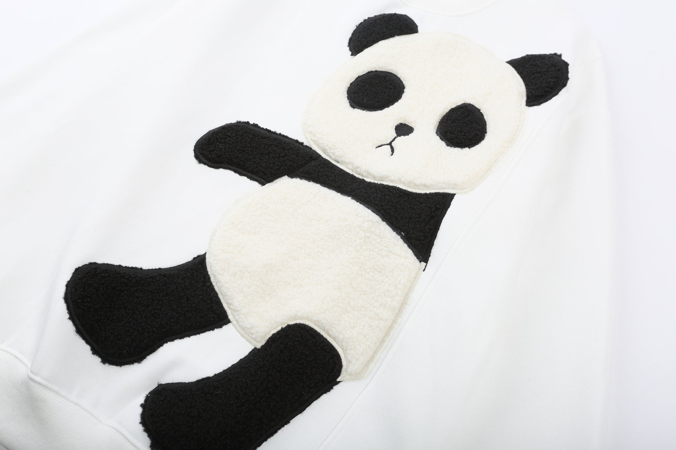 Niepce MAR1081 Furry Panda Crewneck sweater with a soft, plush panda design on the front, in a cozy, casual style.