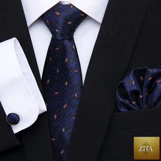 Elegant red silk tie with matching cufflinks and handkerchief, perfect for men's business or wedding suits.
