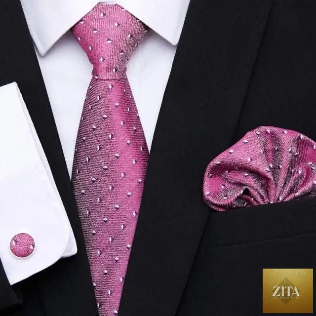 Elegant red silk tie with matching cufflinks and handkerchief, perfect for men’s business or wedding suits.