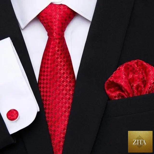 Elegant red silk tie with matching cufflinks and handkerchief set, ideal for men's business and wedding suits, by Stevvex.