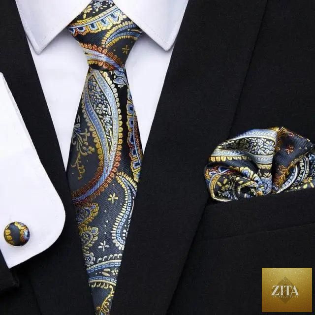 Elegant red silk men's necktie and cufflinks set with matching handkerchief, perfect for business or wedding suits by Stevvex.