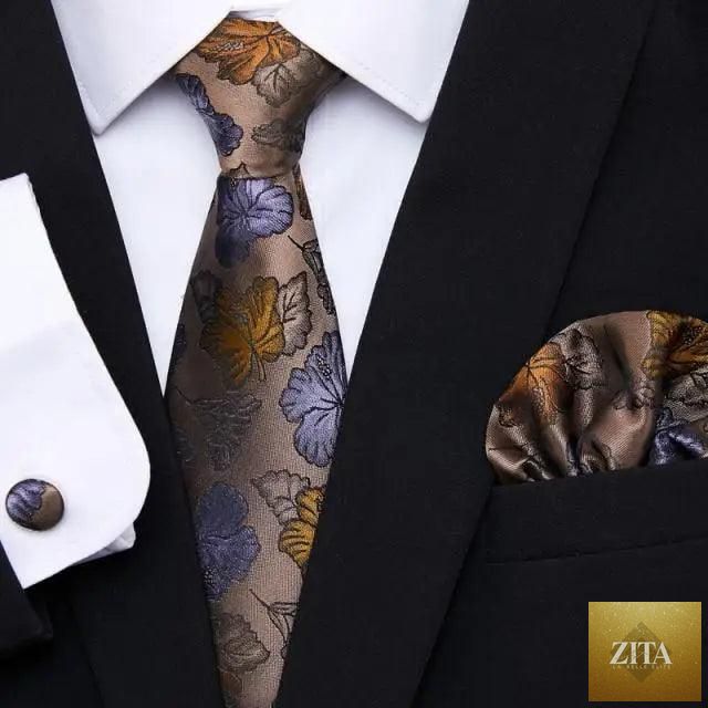 Men's elegant red silk necktie with matching cufflinks and handkerchief set, ideal for business or wedding suits by Stevvex.