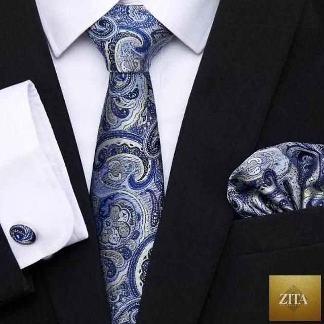 Elegant red silk tie, matching cufflinks and handkerchief set for men, perfect for business or wedding suits, by Stevvex.