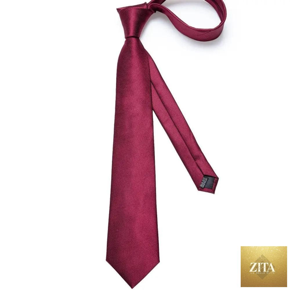 Men’s luxury red silk necktie with matching cufflinks set, elegant design for wedding or business occasions by Stevvex.