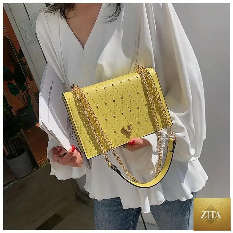 Elegant Sterling PU leather crossbody bag for women with designer chain strap, featuring a modern, luxurious look and spacious interior.