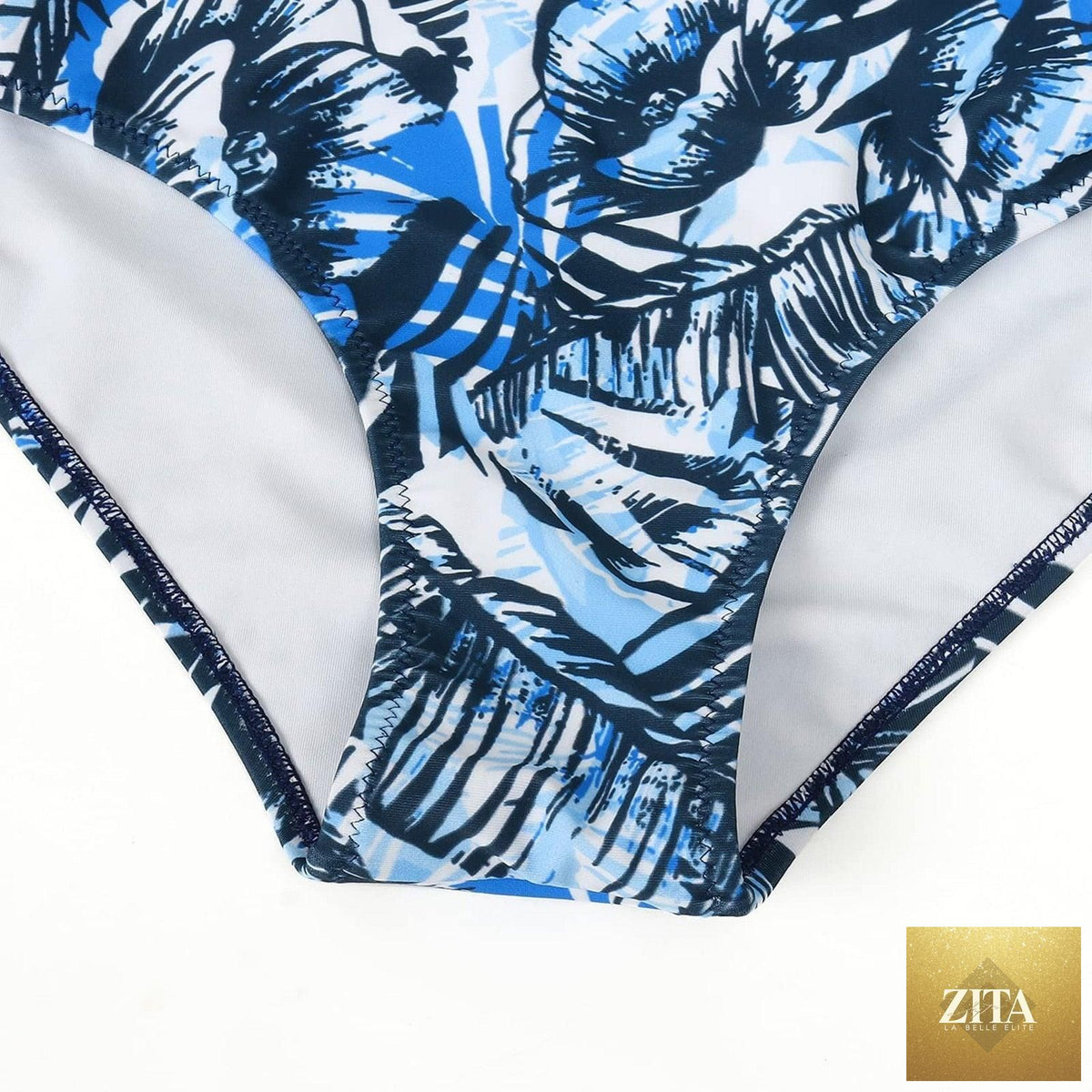 Stevvex modern floral bikini set for women, high waist string bikini with flower print and crisscross design, suitable for summer swimwear.