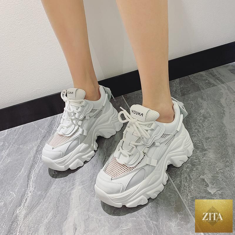 White Stevvex thick platform sneakers for women featuring lace-up design, vulcanized soles, lightweight, comfortable walking footwear.