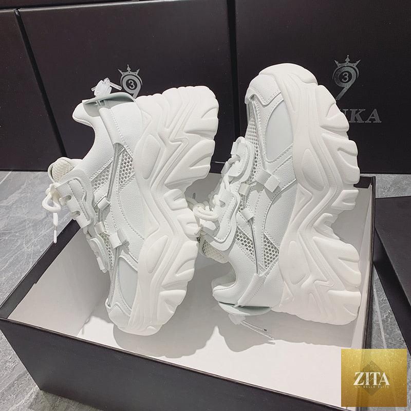 White modern thick platform sneakers for women by Stevvex, lightweight vulcanize shoes with lace-up design and comfortable walking fit.