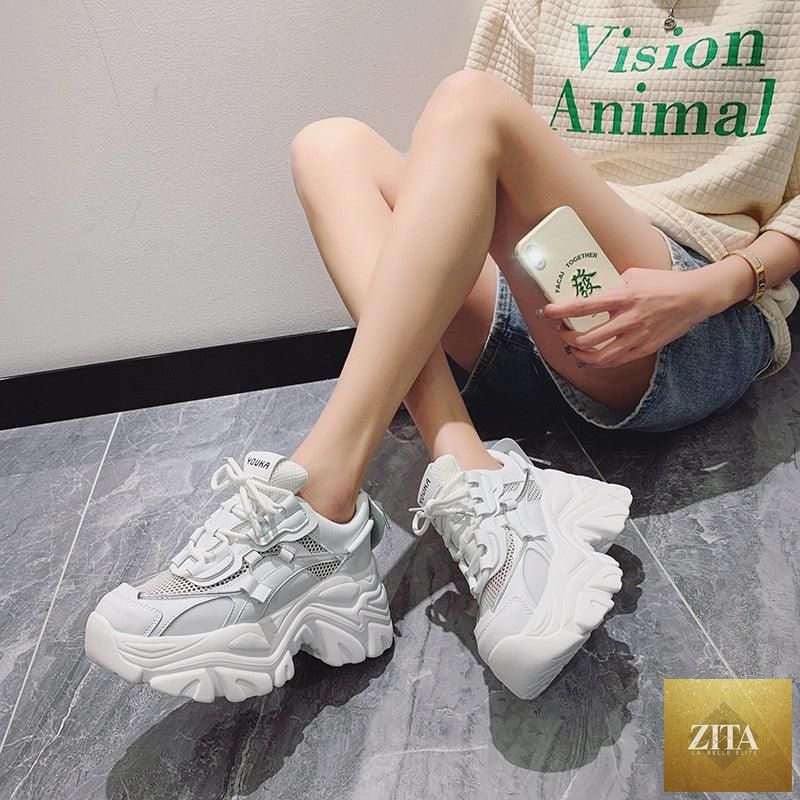 White women's Stevvex thick platform sneakers with lace-up design, vulcanized sole, lightweight, comfortable walking footwear.