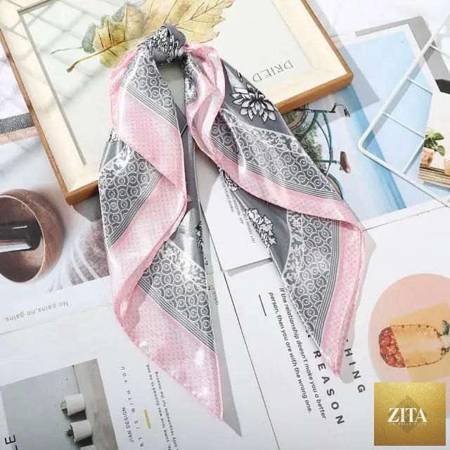 Stevvex multi-functional square silk scarf 60x60cm used as headband, hairband, or neck accessory, made of satin fabric.