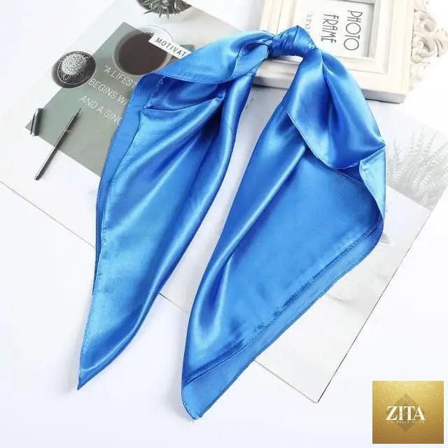 Stevvex multi-functional square silk scarf 60x60cm used as headband, hairband, or neck accessory, made of satin fabric.