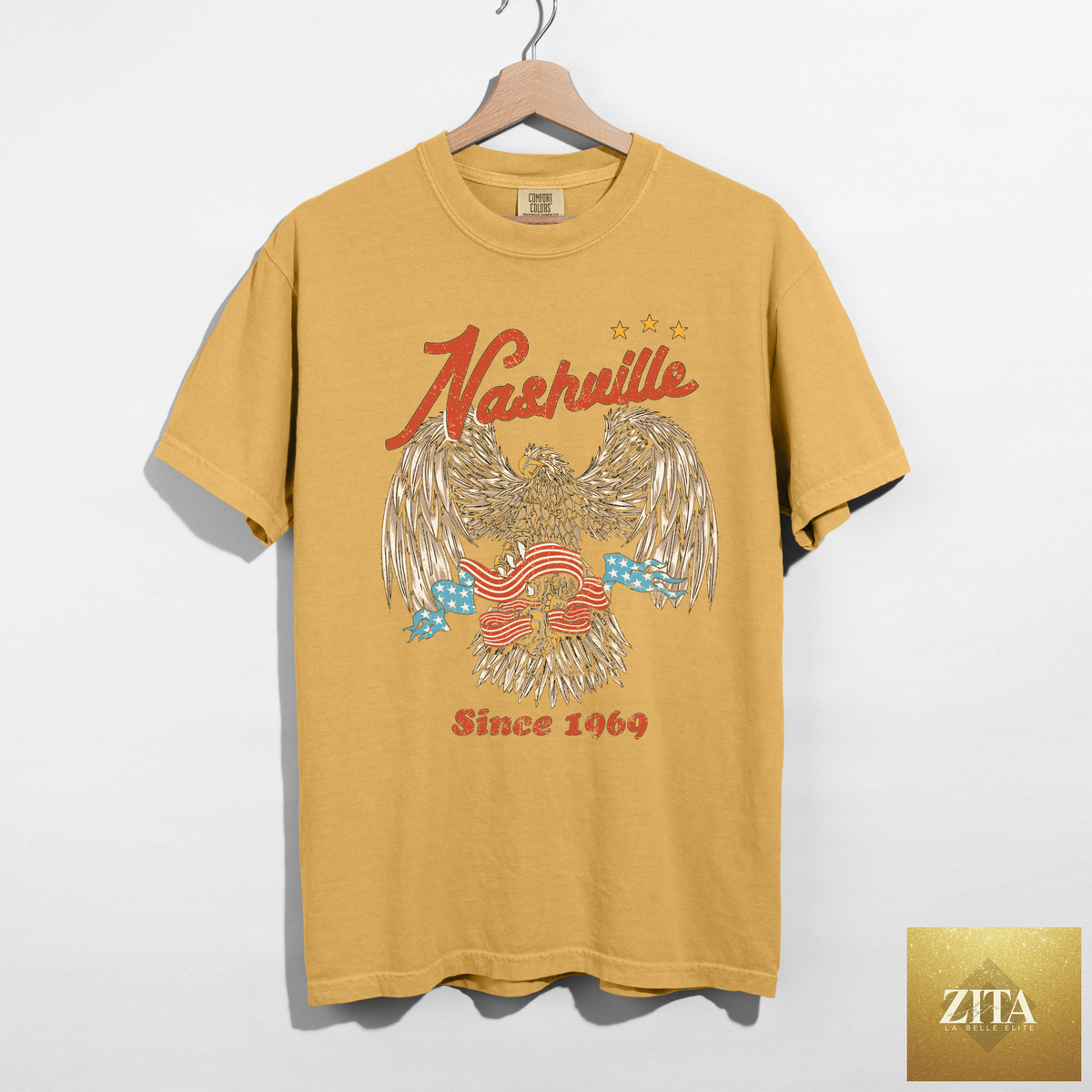 Mustard Nashville graphic tee featuring a vintage eagle design, perfect for country concerts and casual wear by Hey Jude Graphic Tees.