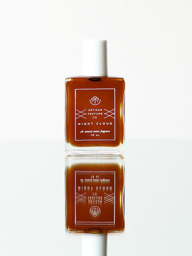 Night Cloud perfume by Smoke Perfume in a sleek bottle with a dark, cloud-like design, ideal for evening wear and sophisticated scents.