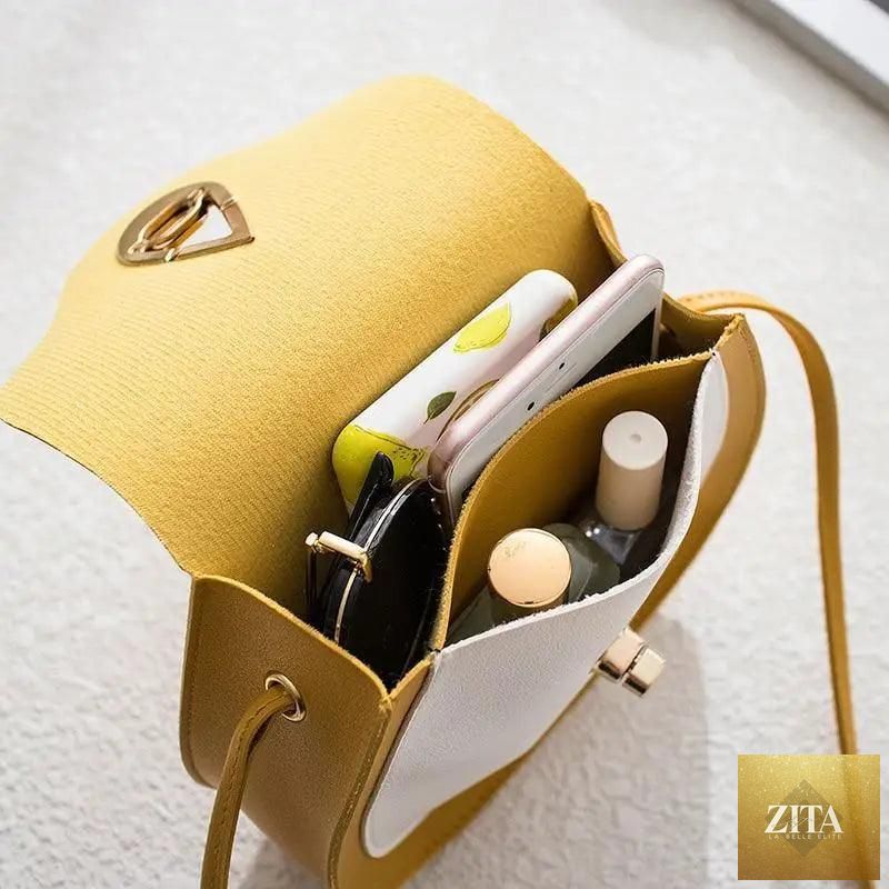 Elegant genuine leather handbag by Stevvex featuring a stylish shoulder bag, purse, and shell crossbody bag for women.