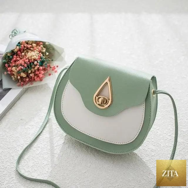 Elegant genuine leather handbag by Stevvex featuring a stylish PU leather shoulder bag with a small shell crossbody and phone purse.