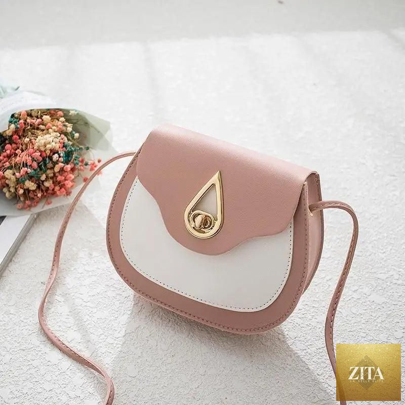 Elegant genuine leather handbag from Stevvex featuring a stylish PU leather shoulder bag, small crossbody shell purse, and women's fashion bags