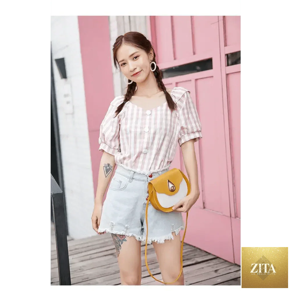 Elegant Stevvex genuine leather handbag for women, featuring a stylish shoulder bag, crossbody purse, and small shell design.