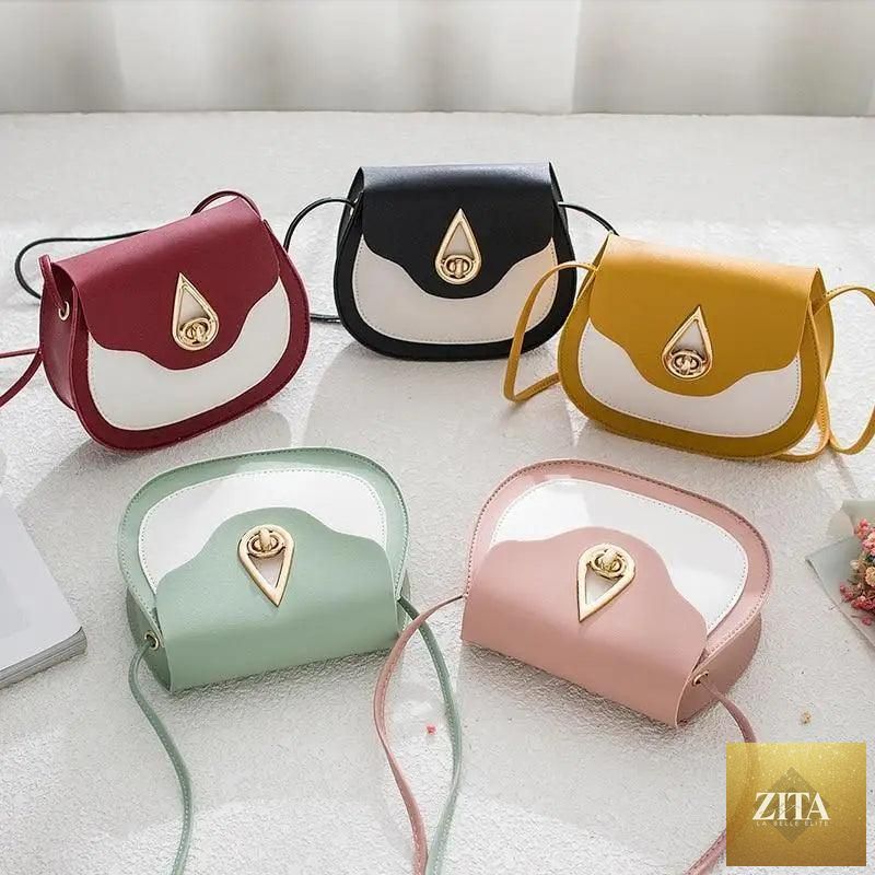 Elegant genuine leather handbag by Stevvex featuring a fashionable PU leather shoulder bag, crossbody purse, and small shell design.