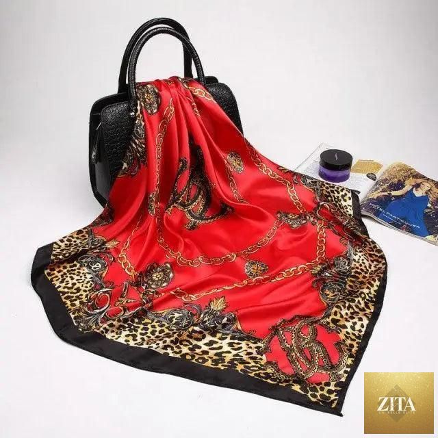 Elegant silk satin scarf for women with colorful print, measuring 90x90cm, styled as a fashionable hijab or bandana by Stevvex.
