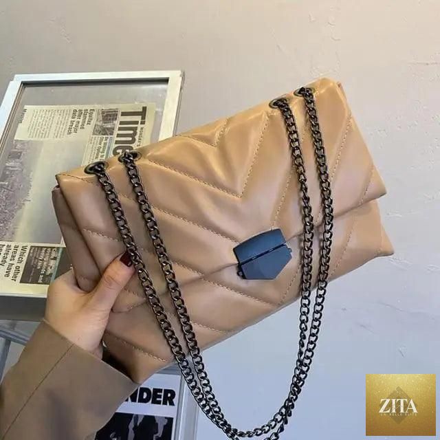 Elegant Stevvex genuine leather handbag with chain crossbody strap, casual design, perfect for women’s fashion and everyday use.