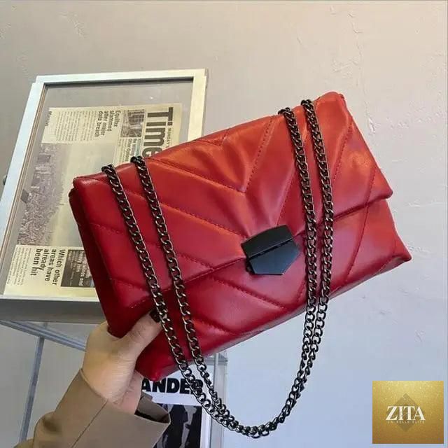 Elegant genuine leather Stevvex women's crossbody handbag with a casual chain strap, simple shoulder bag for fashionable ladies.