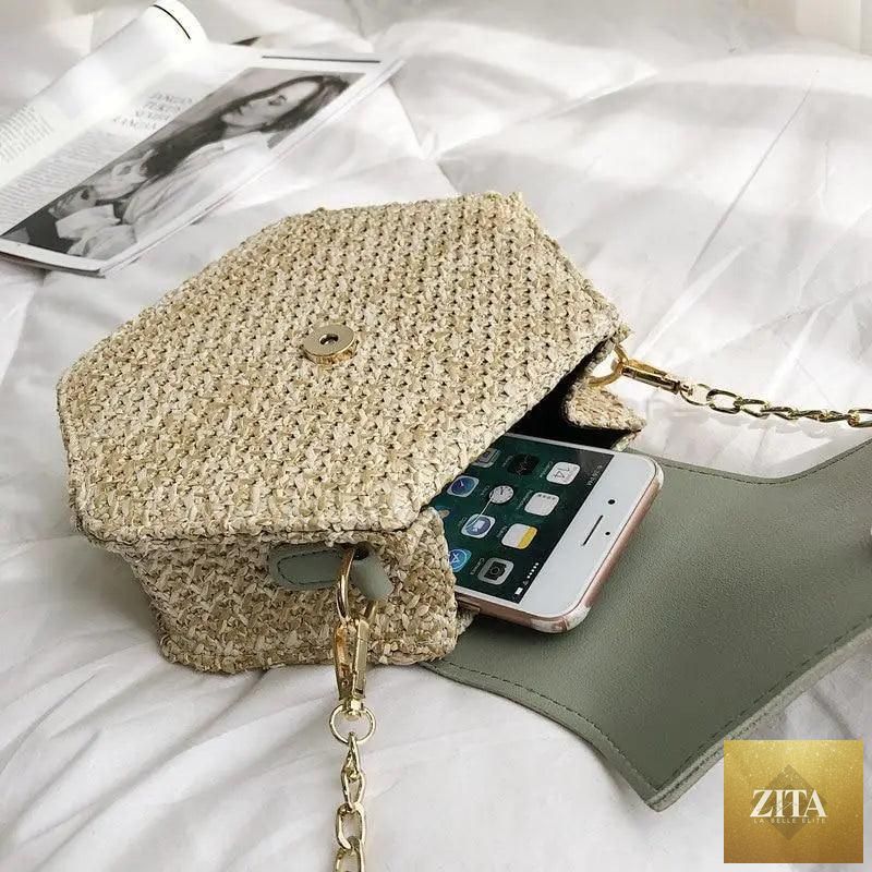 Elegant genuine leather handbag by Stevvex featuring a multi-style straw and leather design, perfect for summer beach outings.