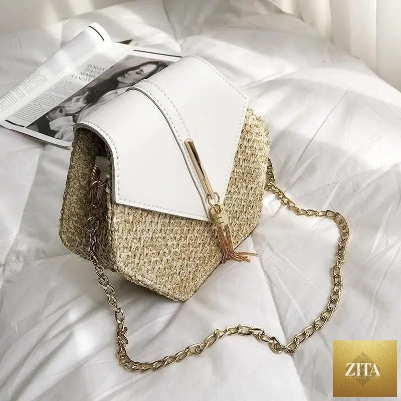 Elegant genuine leather handbag by Stevvex with multistyle straw and leather design, perfect for women and girls for summer outings.