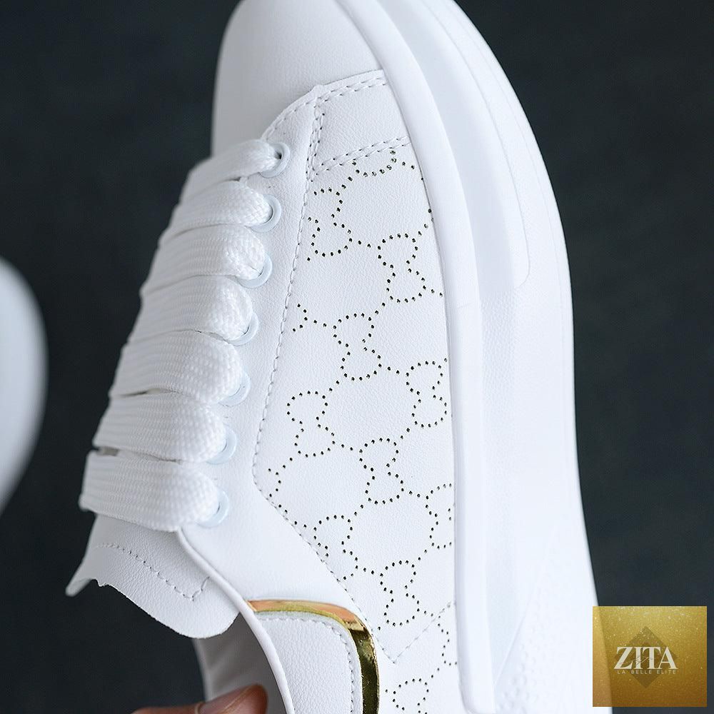 Women's white Stevvex athletic sneakers with thick soles, breathable fabric, lace-up design, ideal for sports and casual summer wear.