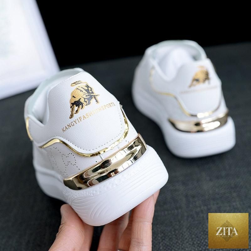 White Stevvex women's sports shoes with thick soles, breathable lace-up trainers, ideal for gym, running, and casual wear.