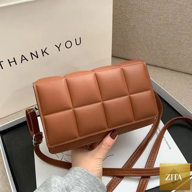 Trendy female cross body bag by Stevvex featuring a literary-inspired single-shoulder design with minority pattern details.
