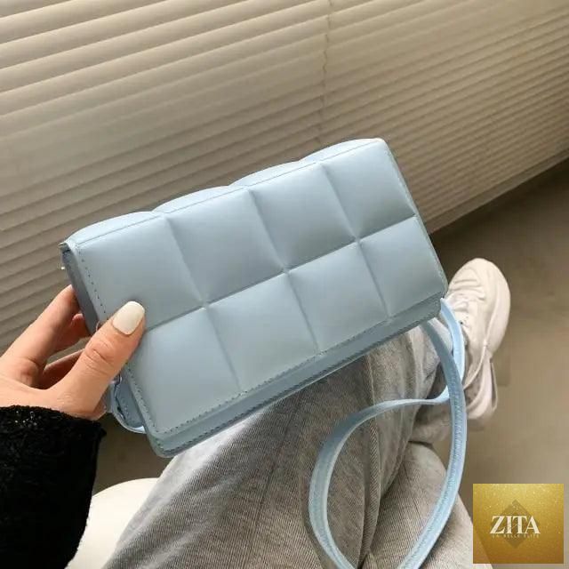 Trendy female cross body bag by Stevvex featuring a literary-inspired single-shoulder design with minority-inspired patterns.