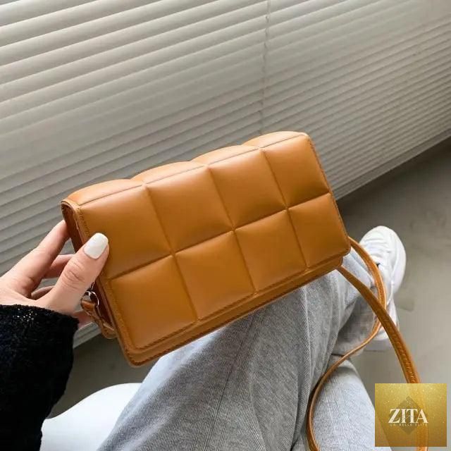Trendy female cross-body bag by Stevvex featuring a literary-inspired single-shoulder design with minority-style pattern.
