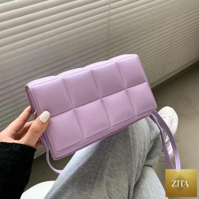 Trendy Stevvex female cross body bag with a literary-inspired design and single-shoulder style in vibrant minority pattern.