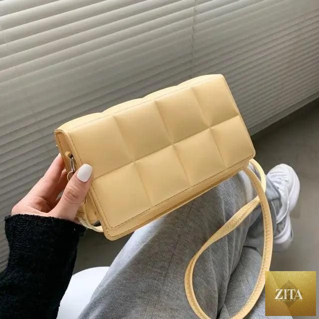 Trendy female cross body bag by Stevvex featuring a literary-inspired single-shoulder design with minority pattern details.