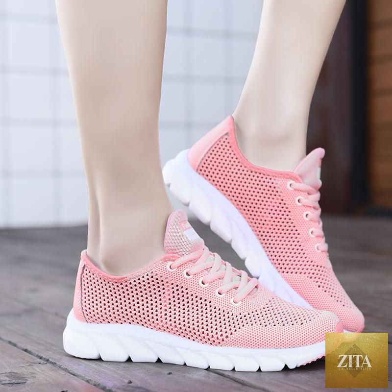 Stevvex women's breathable mesh sneakers with flat, lightweight design, non-slip sole, ideal for walking and running.