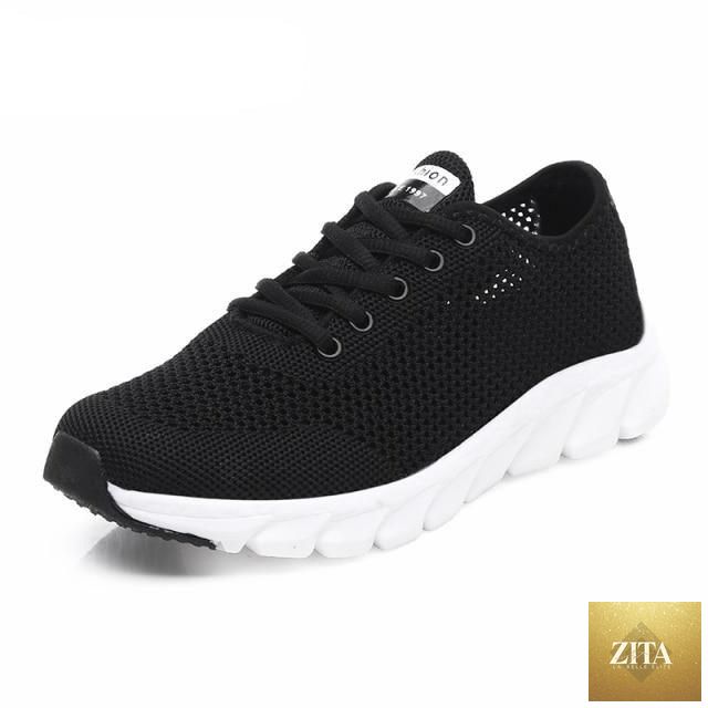 Stevvex women's breathable mesh sneakers with flat design, lightweight, non-slip soles, suitable for walking and running activities.
