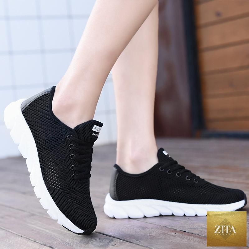 Stevvex women's mesh breathable flat sneakers with lightweight design, non-slip soles, suitable for walking and running.