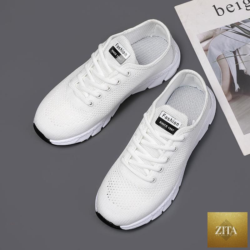 Stevvex women's breathable mesh sneakers with flat design, lightweight, non-slip sole, ideal for running and walking.