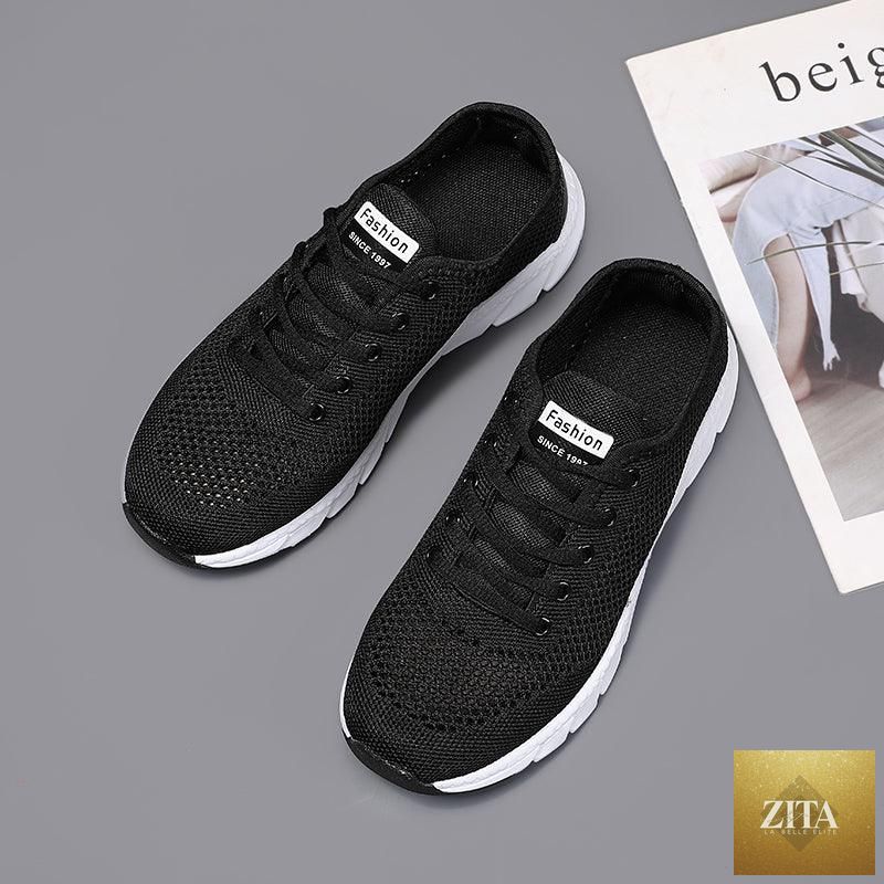 Stevvex women's mesh breathable flat sneakers with lightweight design, non-slip soles, ideal for running and walking.