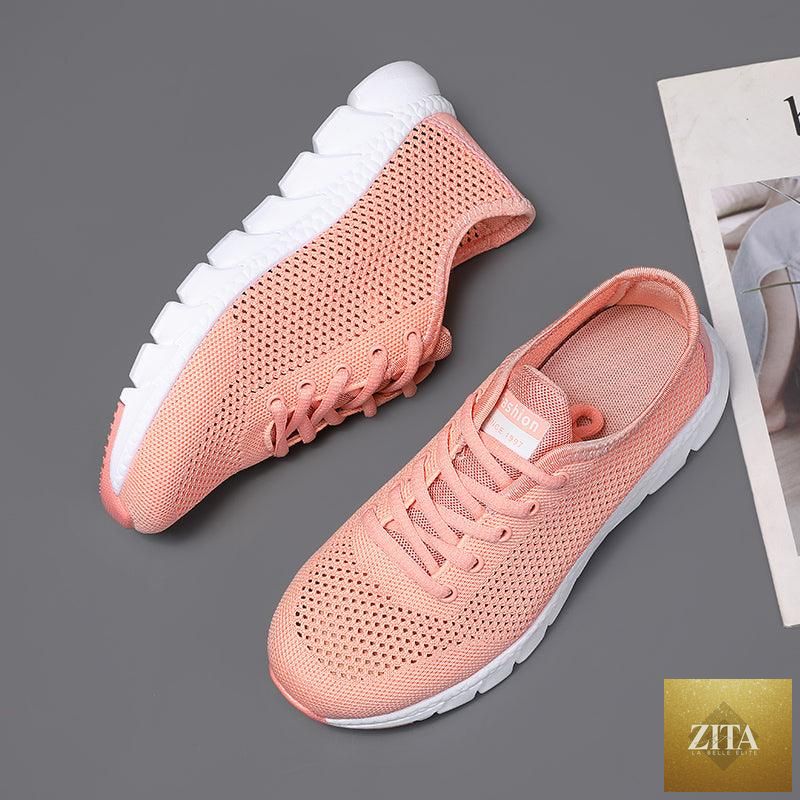 Stevvex women's mesh breathable flat sneakers with lightweight design, non-slip soles, ideal for running and walking.
