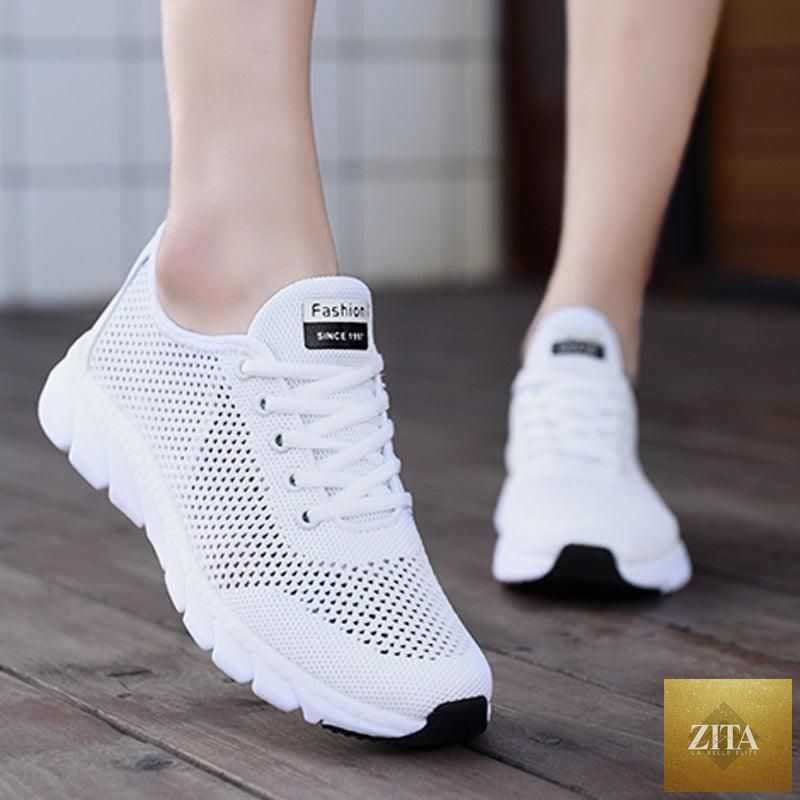 Stevvex women's mesh breathable flat sneakers with lightweight design, non-slip soles, ideal for running and walking.