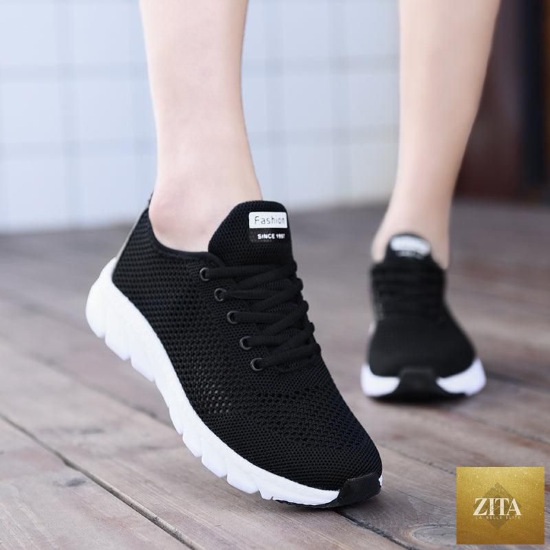 Stevvex women's mesh breathable sneakers with flat design, lightweight, non-slip soles, ideal for running and walking.