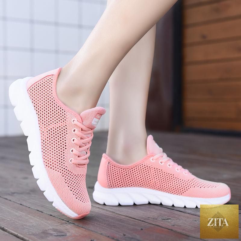 Stevvex women's mesh breathable flat sneakers with lightweight design, non-slip soles, ideal for running and walking.