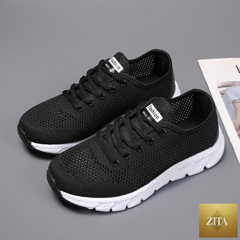 Stevvex women's mesh breathable flat sneakers with lightweight design, non-slip sole, ideal for walking and running.