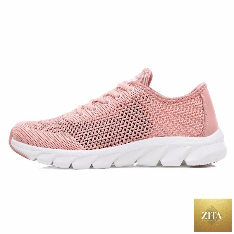 Stevvex women's mesh breathable flat sneakers with lightweight design, non-slip soles, ideal for running and walking.