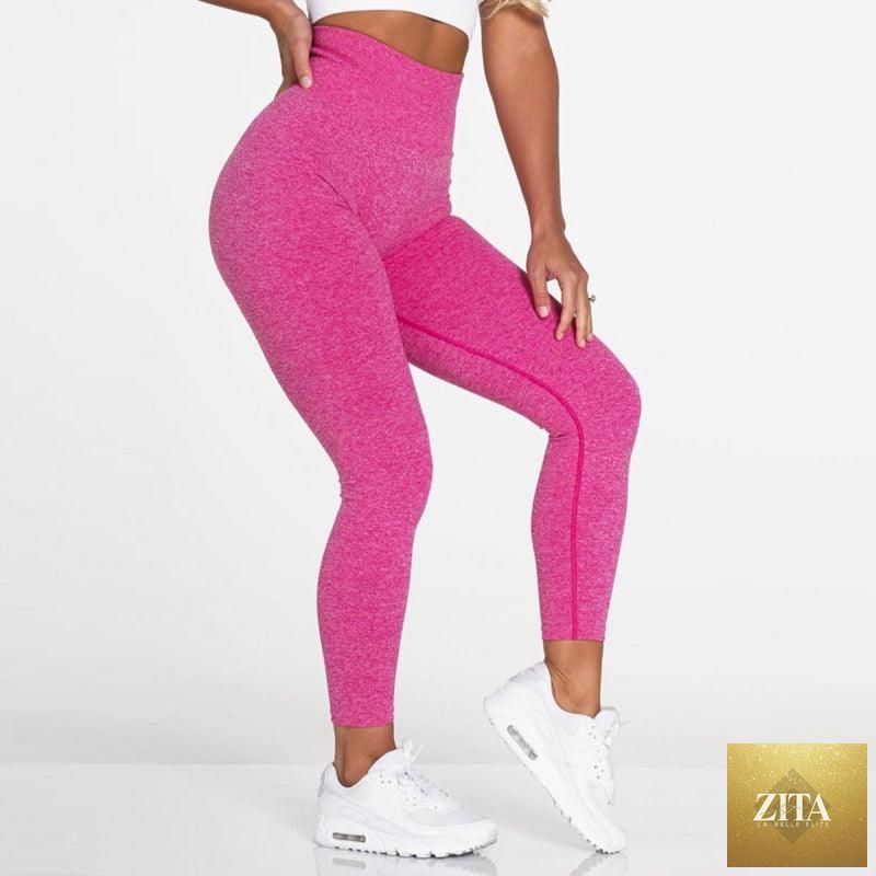 Pink seamless women's workout leggings with high waist, push-up design, and lifting fit, ideal for gym, yoga, and active fitness.