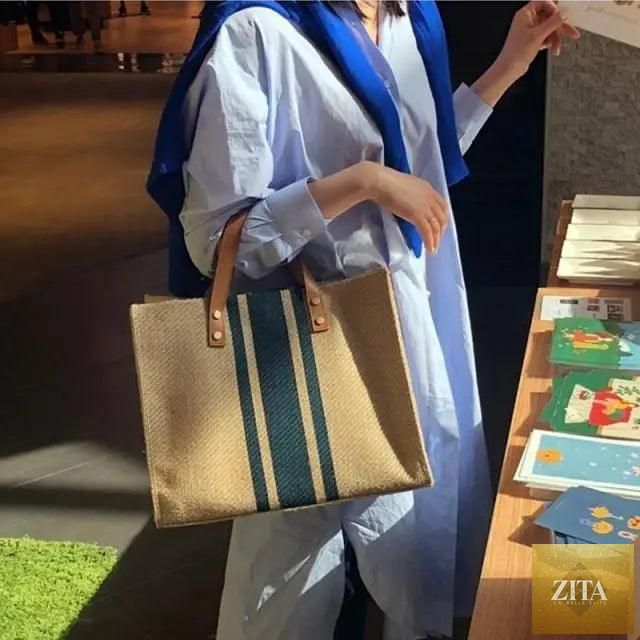 Elegant genuine leather handbag by Stevvex with vintage striped design, large capacity, perfect for ladies' stylish and portable everyday use.