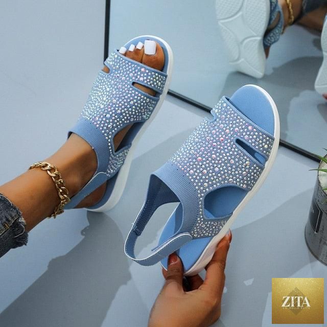 Blue Stevvex women's summer sandals with buckle strap, open toe, slip-on flat, casual beach shoe, modern square slide design.