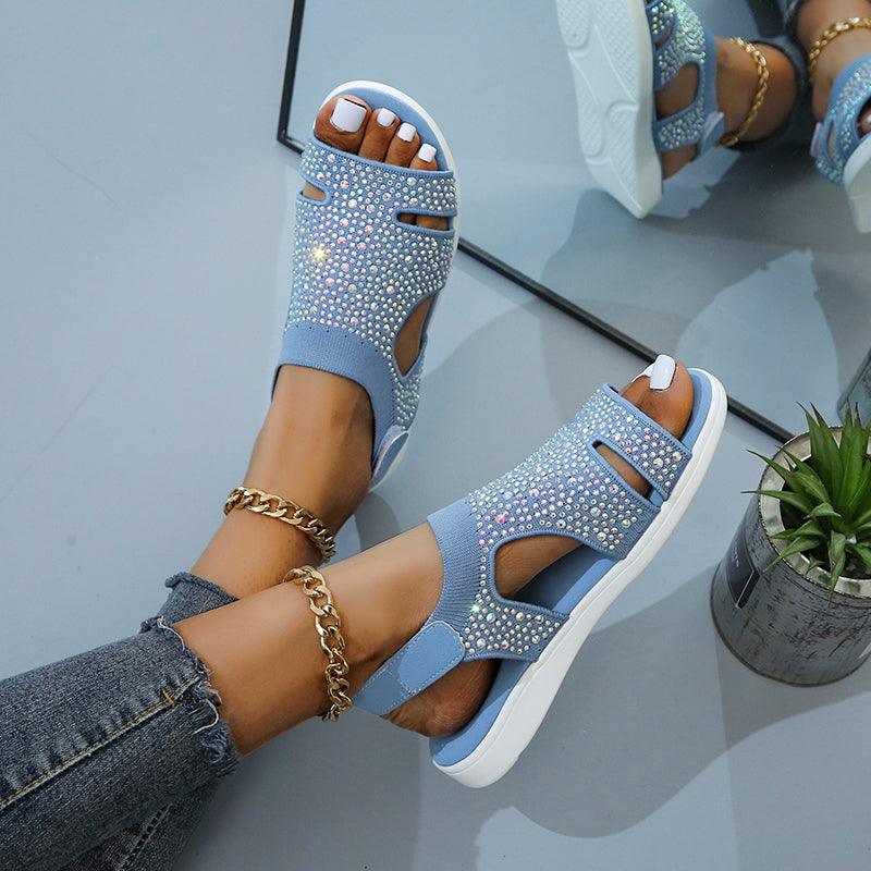 Blue Stevvex women’s summer sandals with buckle strap, open toe, slip-on flat design, perfect for casual beach and dressy wear.