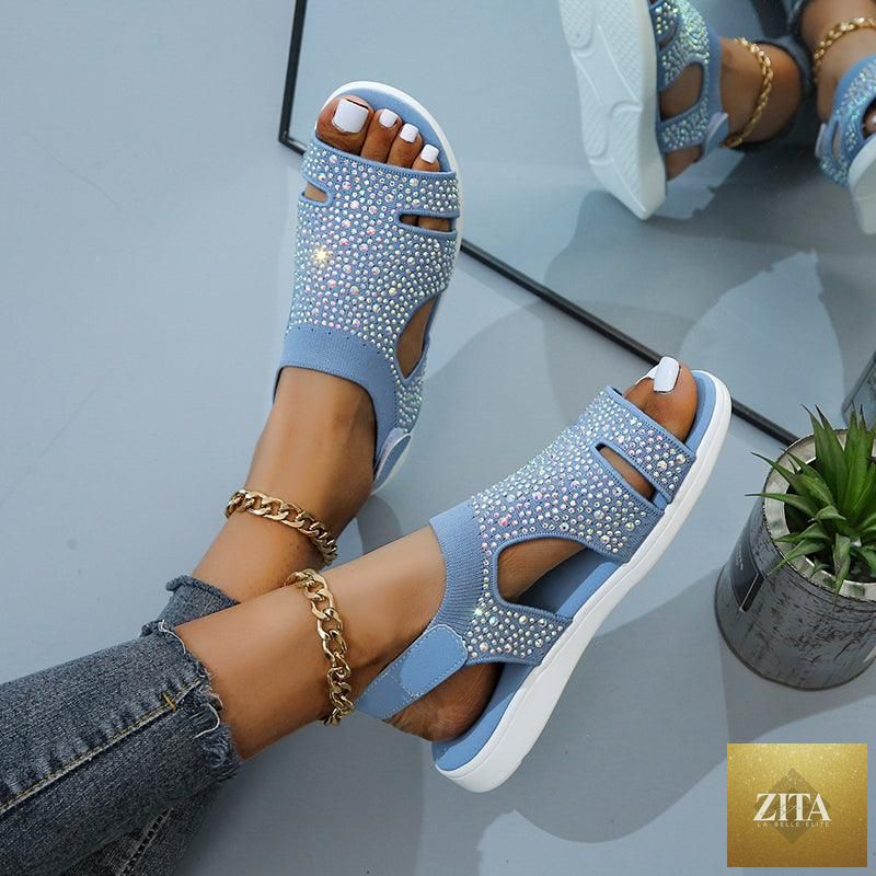 Blue Stevvex women’s summer sandals with buckle strap, open toe, slip-on flat design, perfect for casual beach and dressy wear.